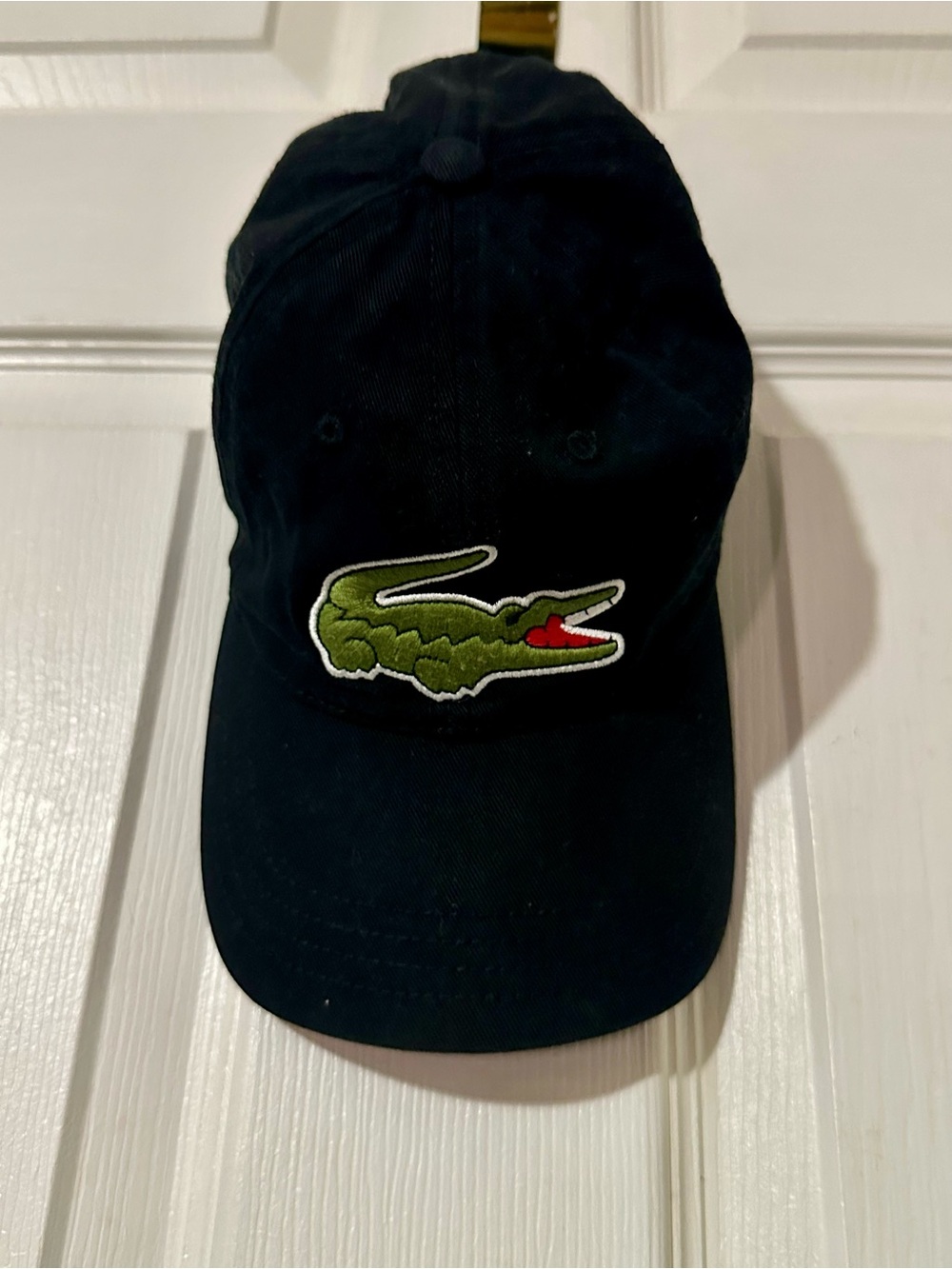 Lacoste Black Cap with Green Branded Interior Taping